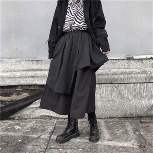 Autumn and winter ladies solid color elastic waist asymmetrical irregular false two layer half skirt high waist half skirt
