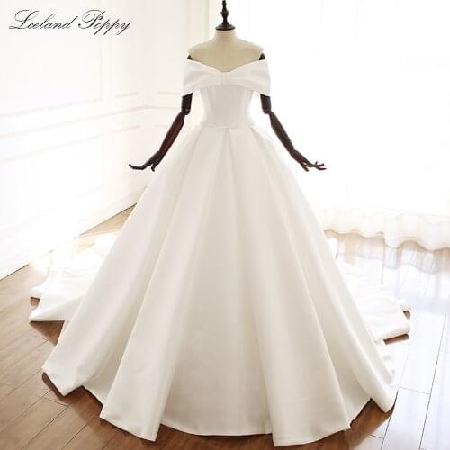 Lceland Poppy A-line Satin Wedding Dresses 2020 Off the Shoulder Floor Length Short Sleeves Bridal Gowns Chapel Train