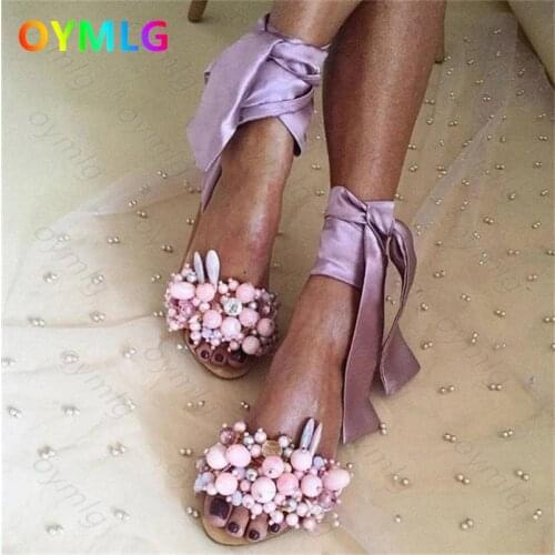 Manufacturers stock new sandals 2021summer round toe beach shoes European American fashion beaded ankle strap sandals large size