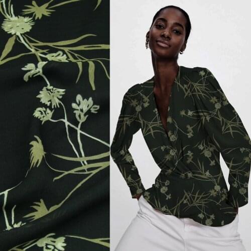 Dark yellow floral design on black bottom silk georgette gauze fabric,SCG548