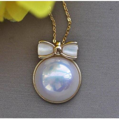 Z11109 Lustre 16mm White Shell Mabe Pearl Bowknot Chain Pendant CZ