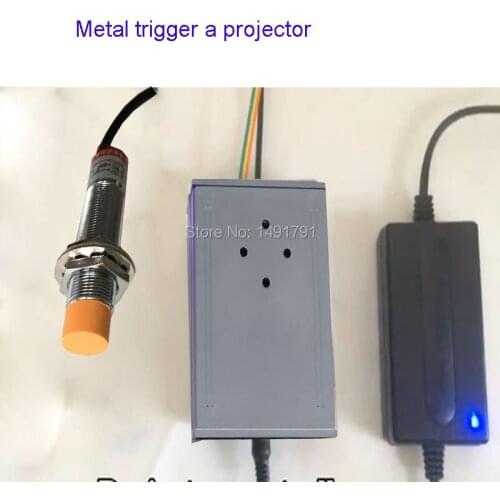 Escape room game Magnetic metal sensor triggered projector prop metalic objector close to get picture or number password clue