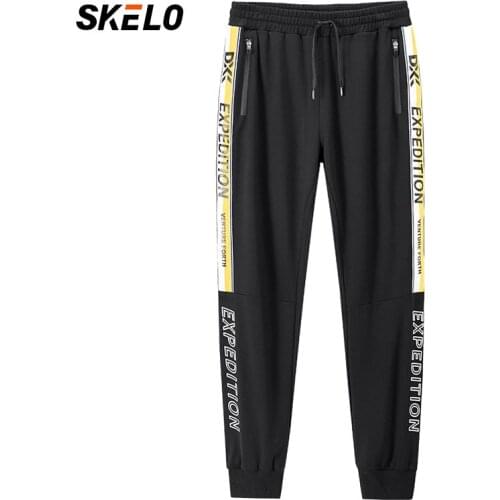 2020 Spring Men Sports Running Loose Pants Pockets Elasticity Waist Legging Jogging Pantalon Pants Casual Trousers Sweatpants
