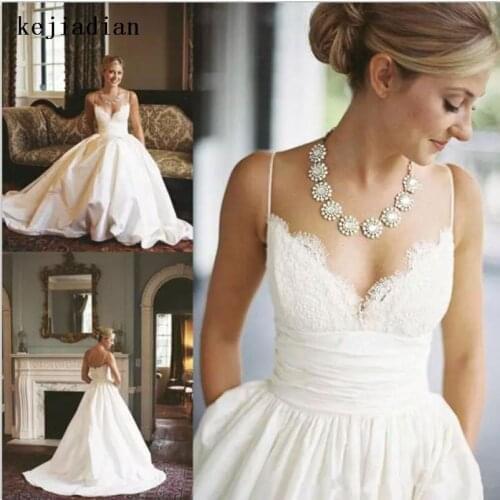 Satin Wedding Dress Sexy spaghetti straps Backless Appliques sweetheart Bride wedding gown Vestido de noiva Robe de mariage