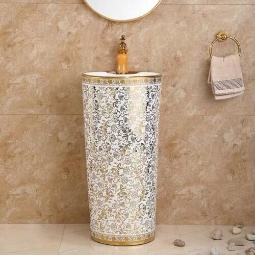 A set of golden toilet basin tap