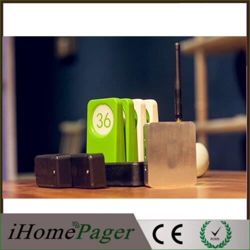 Electronic queue management system restaurant pagers sensor put on the bottom of table track location