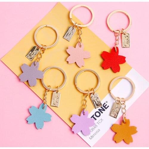 2021 Cute Romantic Flower Sakura Leather High Quality Gold Metal Keychain Trinket Key Chains Car Bag Pendent Charm D472