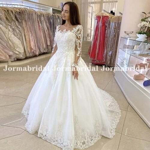 Glamorous Appliques Lace Wedding Dresses With Long Sleeves 2021 Luxury Scoop Neck Princess Bridal Gowns Transparent Buttons Back