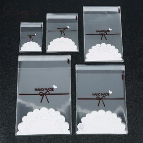 XINYAO 100pcs/lot Storage Bags Clear Self Adhesive Seal Plastic Packaging Bag Resealable Cellophane OPP Poly Bags Gift Bags