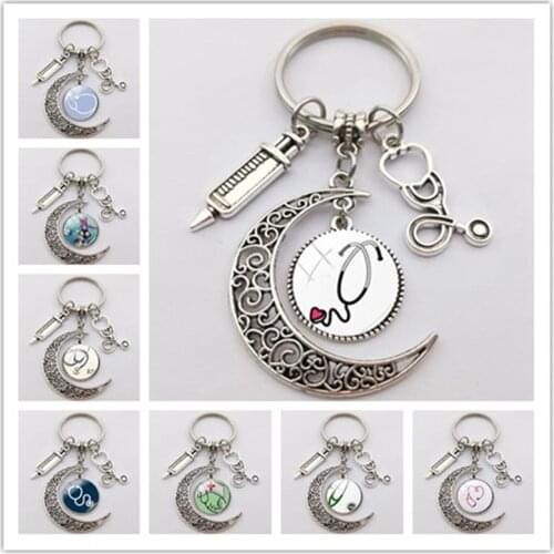 Hospital Nurse Doctor Equipment Stethoscope and Syringe Keychain Syringe Stethoscope Sacred Hospital moon Pendant Keychain
