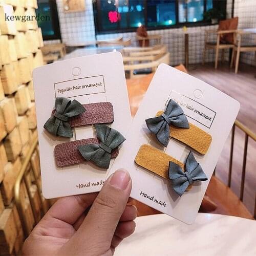 Kewgarden Baby Girls Hair Accessories Barrettes Contrast Color PU Bowknot Hairclips Headwear Side Clips 2 Pair / Lot