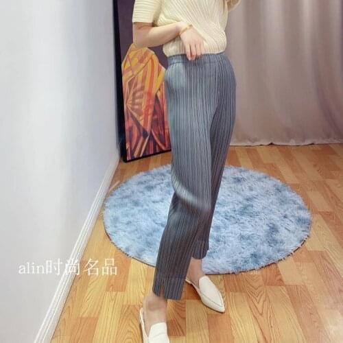 2021 Spring new Fashion pencil pants Issey Miyake pleated niche pants women casual all-match slim hot nine-point straight pants