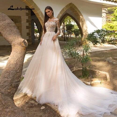 Elegant Long Sleeve Wedding Dresses 2021 Sheer O-Neck Lace Appliques Tulle Backless Bohemian Bride Gown vestido de novia