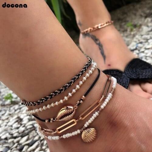 Docona Boho Gold Shell Cowrie Anklet Set for Women Black Weaving White Pearl Charms Beaded Anklet Foot Chain Jewelry 8007