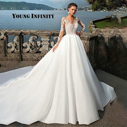 Elegant Satin O Neck Long Sleeves A-Line Wedding Dresses Lace Appliques Luxury Chapel Train Bridal Gown Vestido Longo de Festa