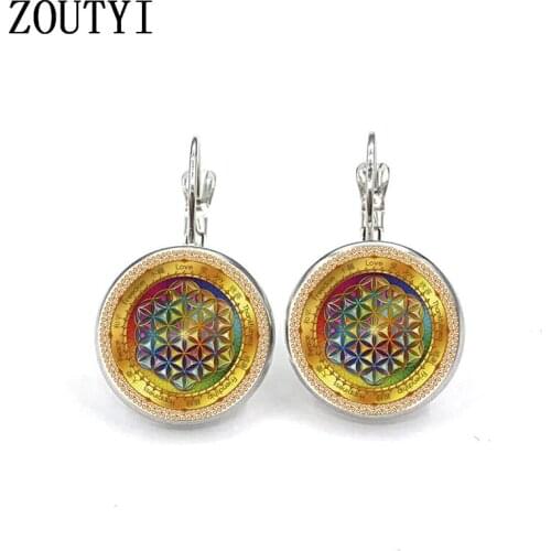 Photo of the new/glamour fashion life flower pattern, convex glass inlay earrings, feminine decoration