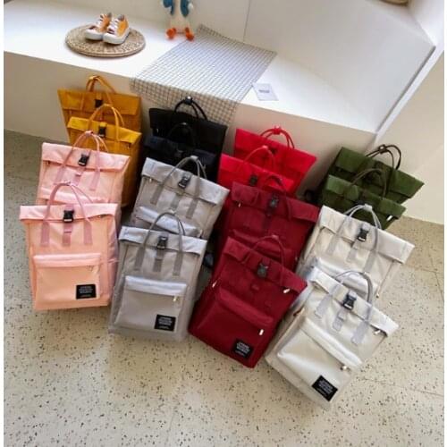 Classic unisex ins hot fashion pinkycolor; candy color backpack high-capacity travel bag computer bag colourful