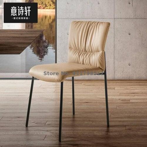 Italian minimalist leather dining chair, light luxury, high-end backrest, home Nordic makeup stool, simple modern designer chair
