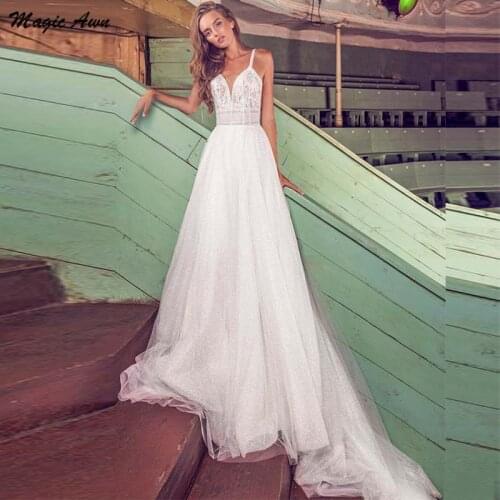 Magic Awn Shiny Princess Wedding Dresses 2021 Lace Appliques Spaghetti Straps Backless Boho Mariage Gowns Illusion Customized