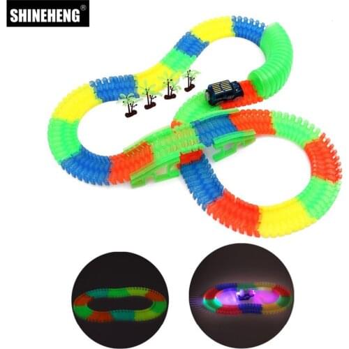 Shineheng Glow Race Track Set Bend Flexible Flash in the Dark Assembly Led Car Toy Stunt Railway Track Car Toy Gift for Boy