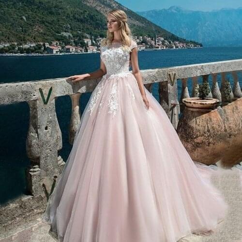Scoop Neck Pink Wedding Dresses Lace Appliques Backless Ball Gown Cap Sleeves Bridal Gowns Vestidos De Novia Gelinlik