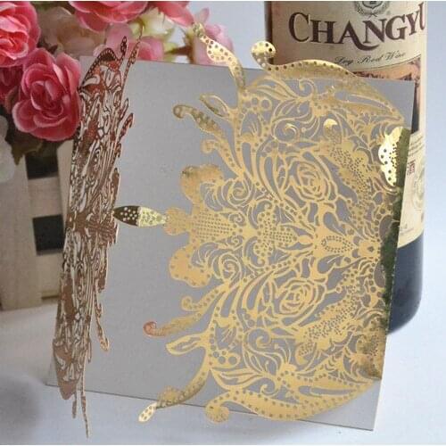 China fancy laser cut wedding invitation card,metallic gold Indian wedding card