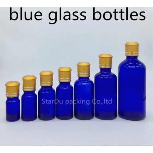 5ml 10ml 15ml 20ml 30ML 50ml 100ml blue Glass Bottle, blue Vials Essential Oil Bottle with Decorative pattern cap