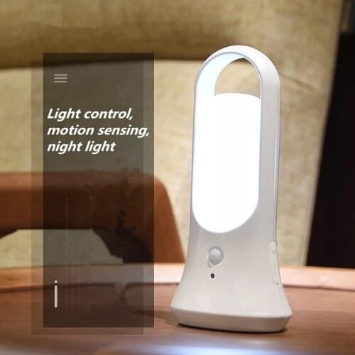 USB charging with motion sensor and illuminated night light portable magnet to absorb smart flashlight table lamp function