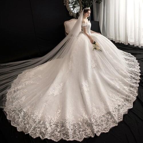 New Gorgeous Royal Train Boat Neck Tassel Sequins Beads Ball Gown Lace Wedding Dress 2021 Bridal Gown Vestido Robe De Mariee