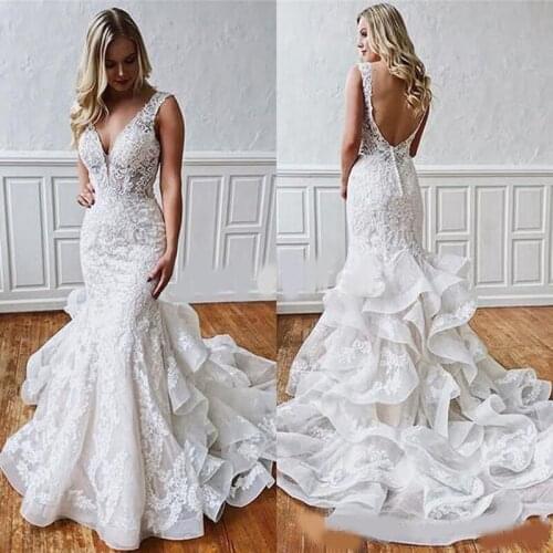 Mermaid Wedding Dresses White Lace Appliques Sexy Deep Veck Open Back Elegant Custom Made High Quality Ruffles Tiered Oraganza
