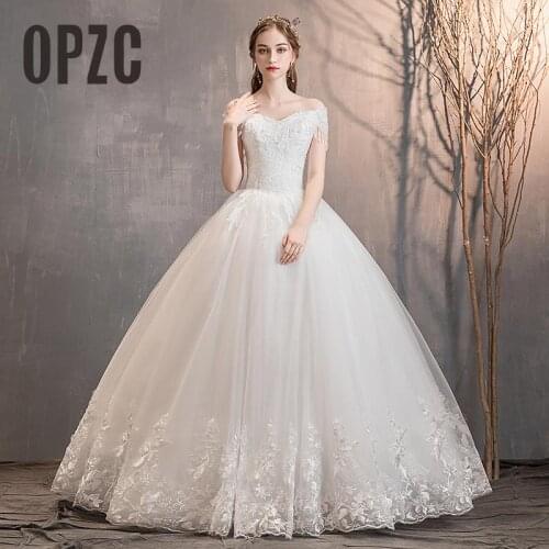 Off shoulder wedidng dress 2020 New sexy boat neck Luxury Lace Beading Vestidos De Novia Ball Gown bride dress short sleeve