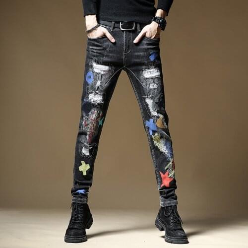 Free shipping new fashion male mens Jeans American black embroidery personality hole patch elastic spring autumn denim pants