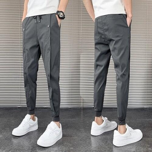 Fashion Korean Solid Joggers Men Button decoration High Quality Spring Autumn Pants Men Slim Fit Drawstring Mens Casual Pants