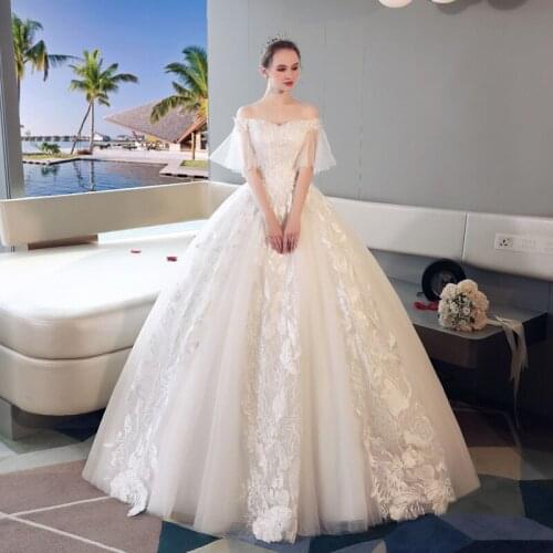 Real Images 2021 New Short Cap Sleeve Bandage Sweetheart Tulle Top Beads Embroidery Lace Luxury Wedding Dress Bridal Gown