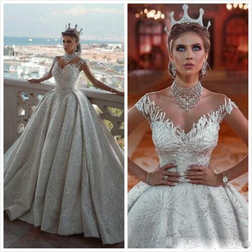 2020 Ball Gown Wedding Dresses Capped Sleeve Lace Appliques Beads Sequins Bridal Gowns Custom Made Sweep Train Wedding Dress