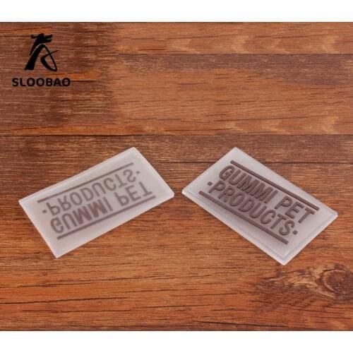Free shipping custom PVC labels brand labels for clothing sew in raised logo labels semi-transparent background rubber label
