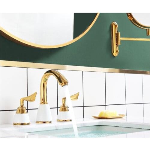 Gold Solid brass copper ceramics Bathroom sink faucet two handle three holes basin mixer faucet cold hot water high quality tap