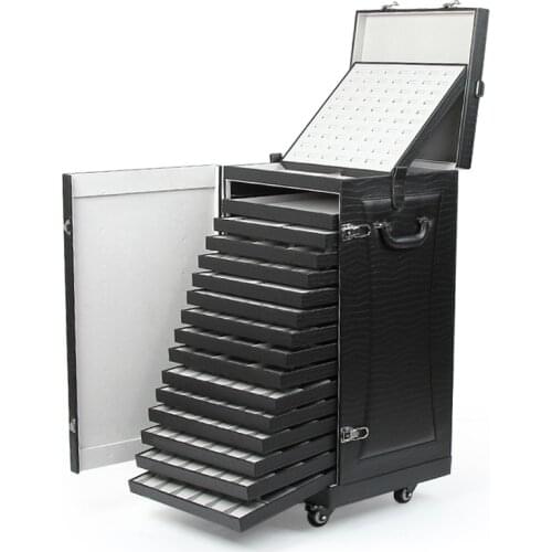 38*40*86 cm Jewelry Storage Box The trolley case refers to a trunk with a drawbar and a roller for jewelry storage or transport