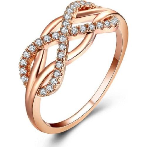 The New FashiOn High-Quality Alloy Micro-Inlaid AAA Zircon Lines Cross Inverted 8-Character Ring Ladies Hollow Ring