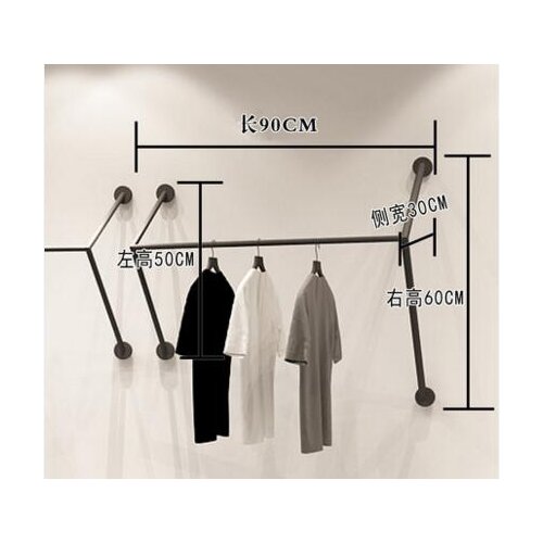 Clothing store display rack. Wall hangers. Hangers on the walls. Metal racks for men and womens fashion shops. Clothes rack.059