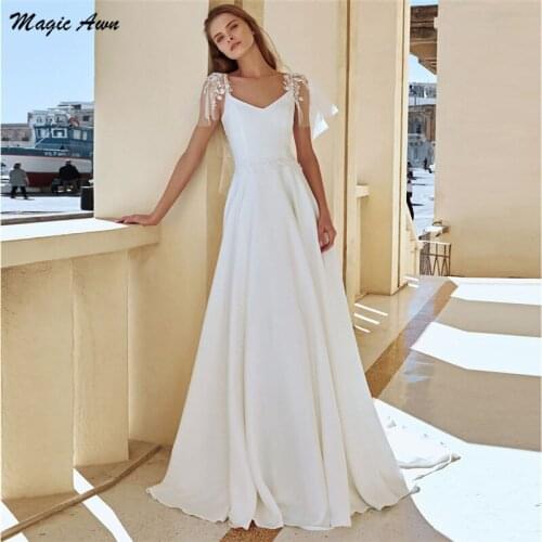 Magic Awn Modest Satin Wedding Dresses 2021 V-Neck Lace Appliques Boho A-Line Bridal Gowns Cap Sleeves Illusion Abito Da Sposa