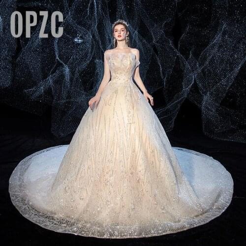 Du bai Wedding Dress 2020 New Champagne long 100 cm train Applique Lace Pleat Starpless sleveless princess Brida Robe De Mariee