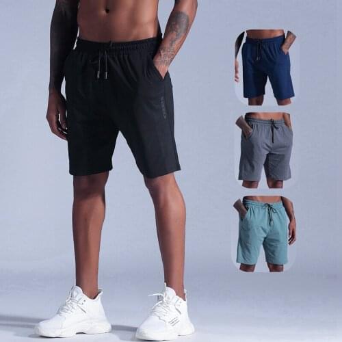 The New Trend of Mens Sport Shorts Spring Summer Breathable Running Exercise Gym Shorts su gan ku Male Casual