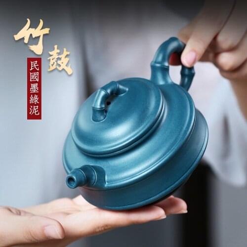 Two strokes] Yixing purple clay teapot pure hand teapot household pan Ye black green mud double line bamboo drum 270cc