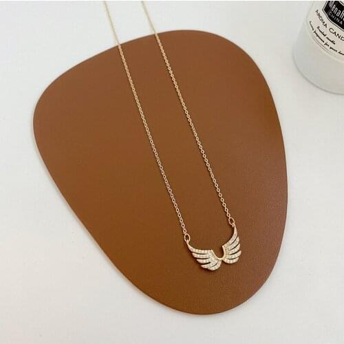 ALLNEWME Korean Full Sparkly Rhinestone Simulation Wing Pendant Necklace for Women Ladies Gold Color Thin Chain Necklace Jewelry