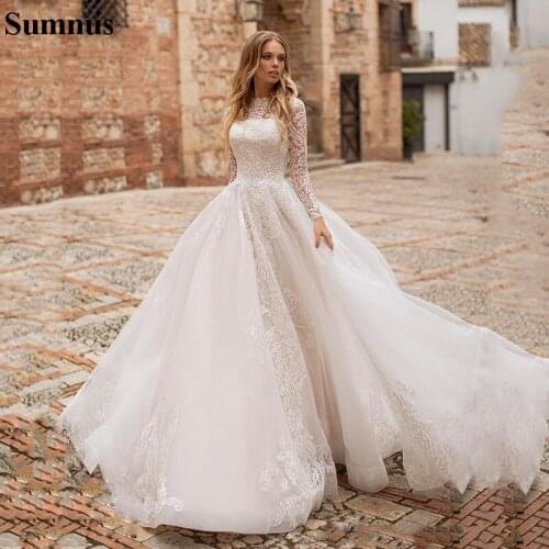 Sumnus Long Sleeves Modest Wedding Dresses Bateau Neck Lace Appliqued Bridal Gowns Sweep Train Country Garden Wedding Dress