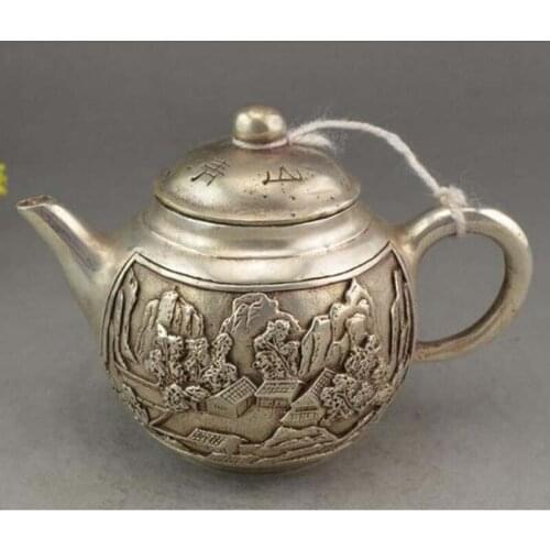 Chinese ancient Tibetan silver hand-carved building design teapot