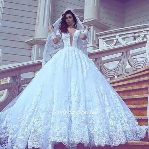 Romantic Deep V-Neck Long Sleeve Arabic Ball Gown Wedding Dress Appliques Lace Illusion Dubai Saudi Bridal Gown Vestido De Novia