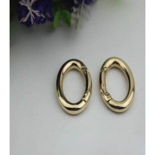 100pcs/lot Luggage hardware accessories the oval spring coil bag die-casting circle pale golden egg-shaped spring coil