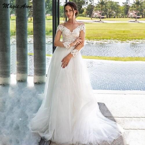 Magic Awn Charming Long Sleeves Wedding Dresses Lace Appliques Beaded A-Line Boho Bridal Gowns Illusion Princess Robe Mariage